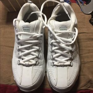 Sketchers Women’s work sneaker with steel toes.